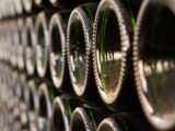 a stack of wine bottles stacked on top of each other