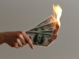 burned 100 US dollar banknotes