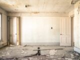 gray concrete walls with broken floor
