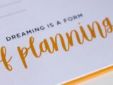 a close up of a piece of paper with writing on it