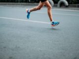 pair of blue-and-white Adidas running shoes