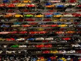 die-cast car collection on rack