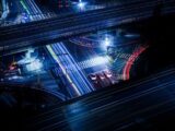 an aerial view of a city street at night