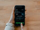 person holding black samsung android smartphone
