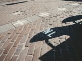 Brick ground with white crosses and