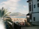 a view of a marina from a balcony